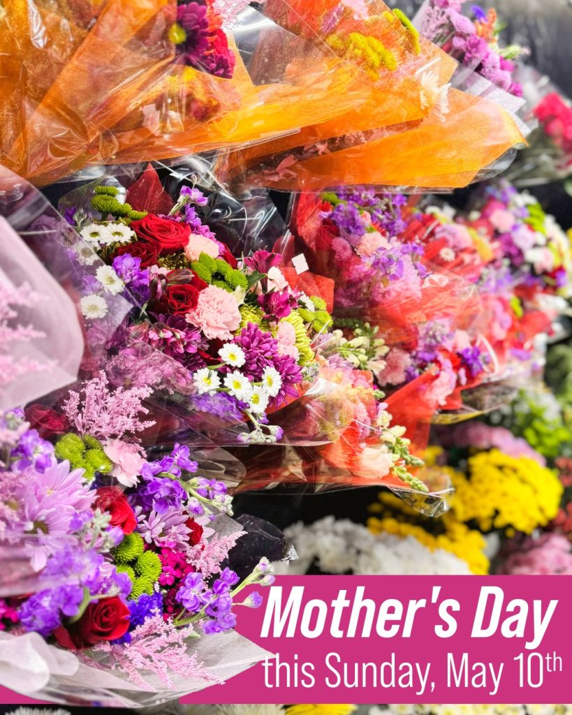 Cooler of gorgeous premade bouquets for Mother's Day